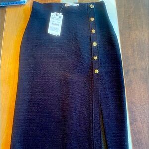 Zara, NWT, small, black fitted skirt with knee high slit and gold buttons.